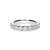 Anillo media alianza de oro blanco con 9 diamantes en talla brillante