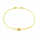 Pulsera Dinh Van Le Cube Cordón Amarillo y Zafiro Amarillo Le Cube