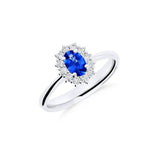 Anillo Roseta con Zafiro Talla Oval 0,40 cts y Diamantes en Oro Blanco