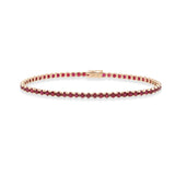 Pulsera rivere, sucesión de piedras como si fuera un río, fabricada en oro rosa y rubis por joyeria calvo de forma artesanal.