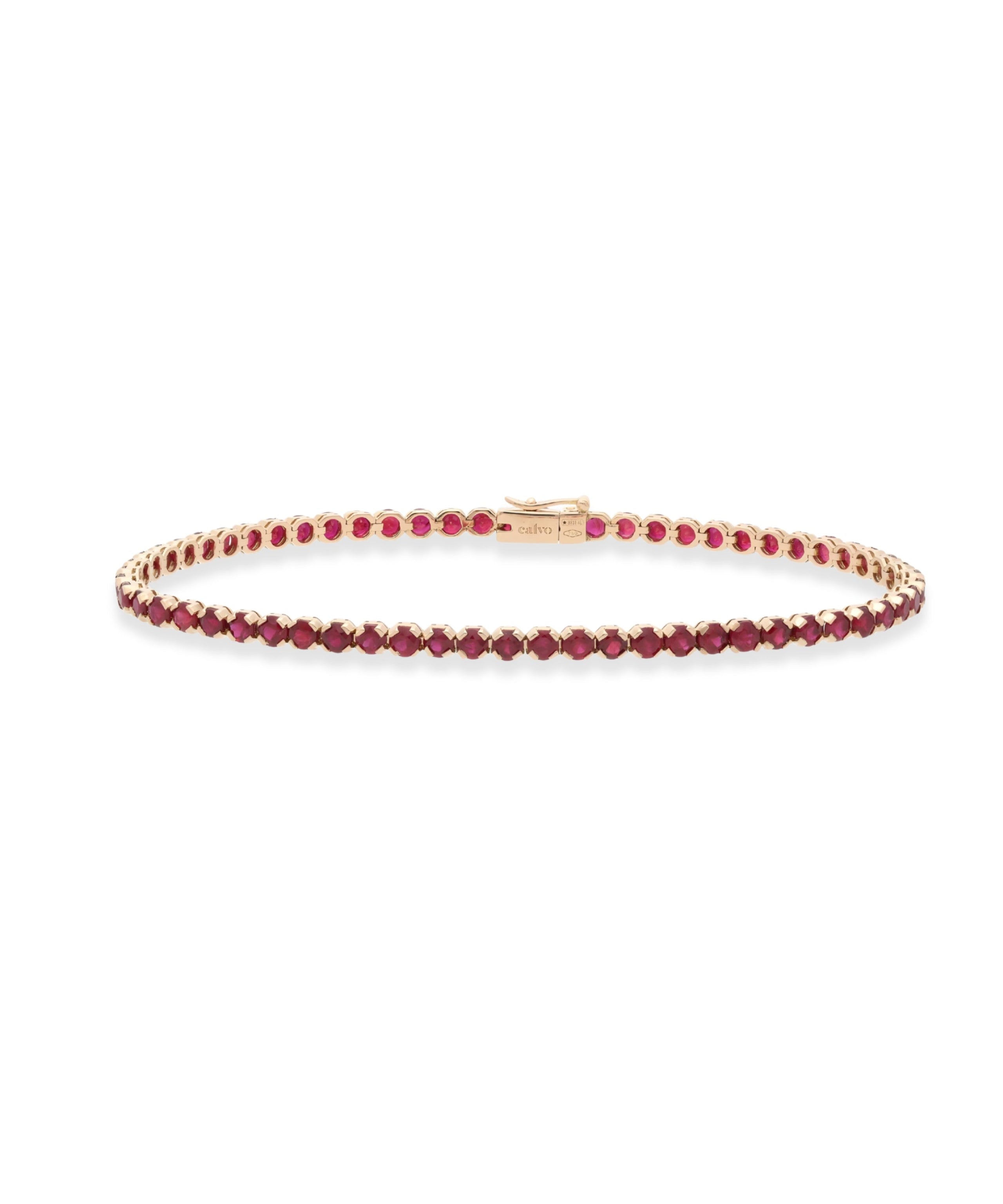 Pulsera rivere, sucesión de piedras como si fuera un río, fabricada en oro rosa y rubis por joyeria calvo de forma artesanal.