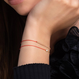 Pulsera Eclipse de Redline Oro Amarillo Hilo Rojo