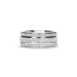 Anillo ancho de oro blanco con diamantes talla brillante en triple hilera
