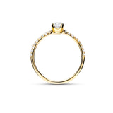 Anillo solitario de compromiso de oro amarillo con diamantes