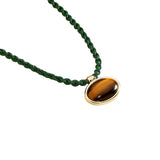 Collar Corto AGATHA París Rhea Cordon Trenzado Ojo de Tigre Dorado | 02680249-274-TU