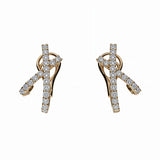 pendientes alta joyería cruzados con diamantes y oro amarillo de joyería calvo