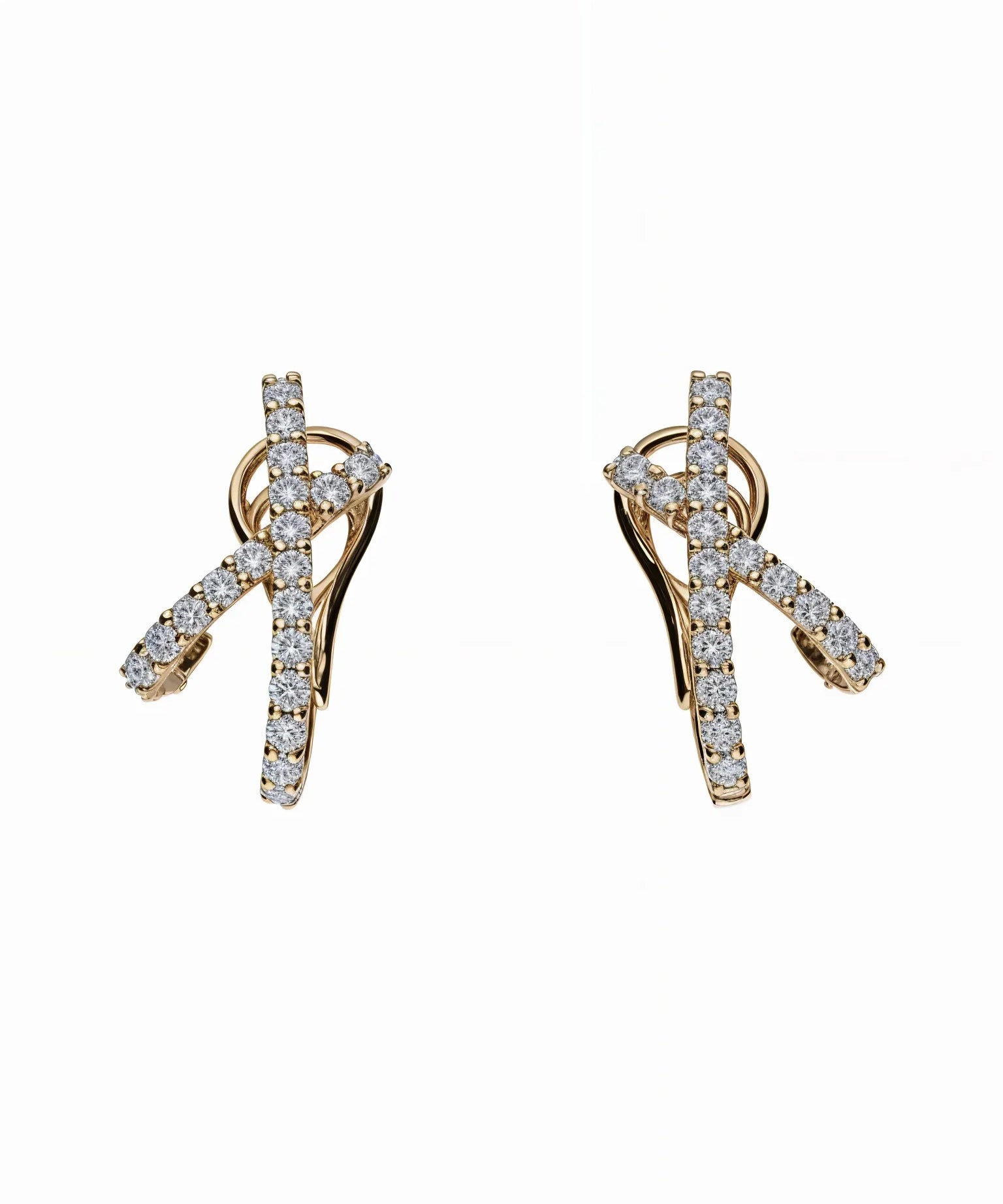 pendientes alta joyería cruzados con diamantes y oro amarillo de joyería calvo